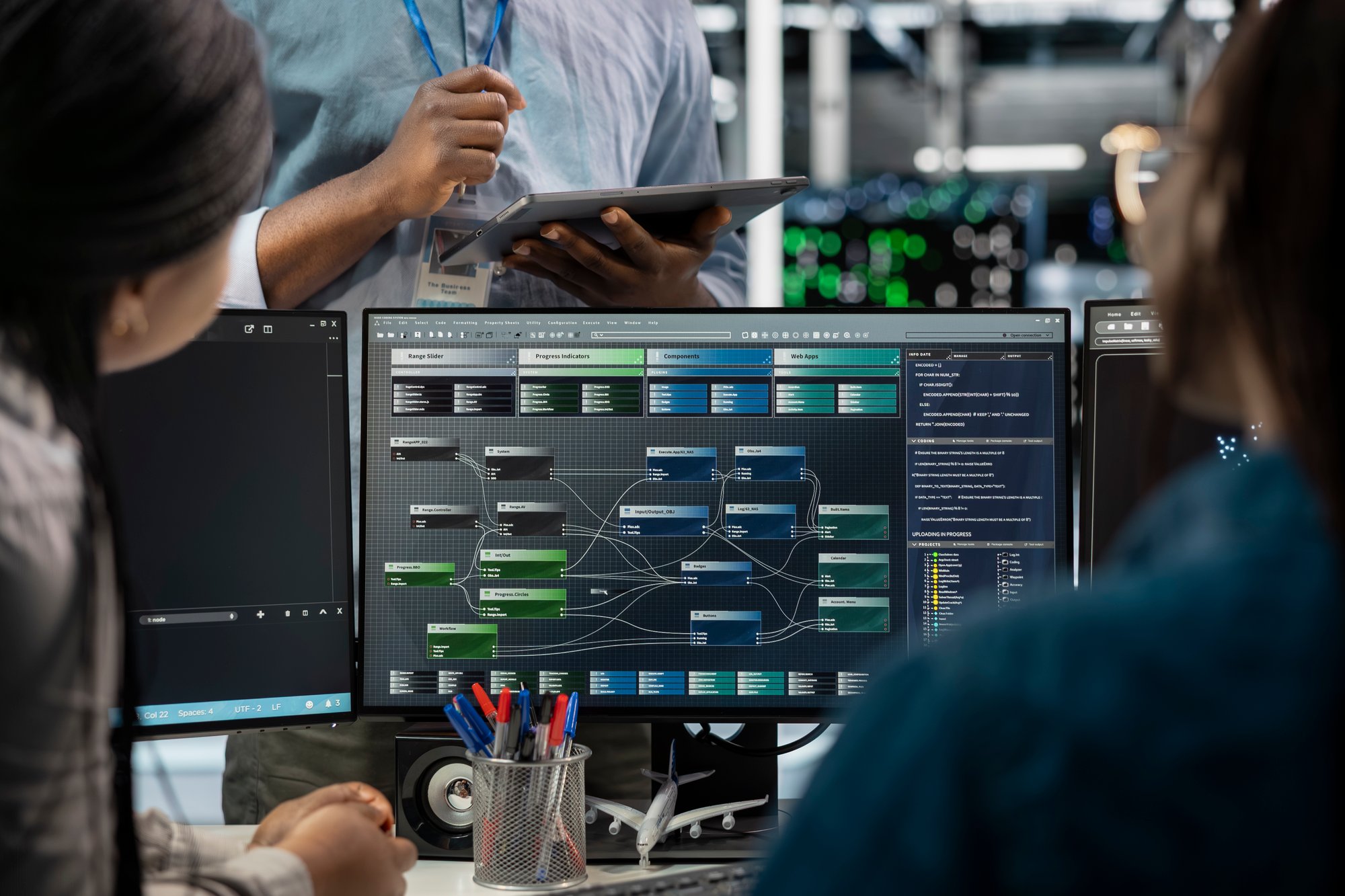 close-up-data-center-programmers-using-pc-visualize-ai-neural-networks