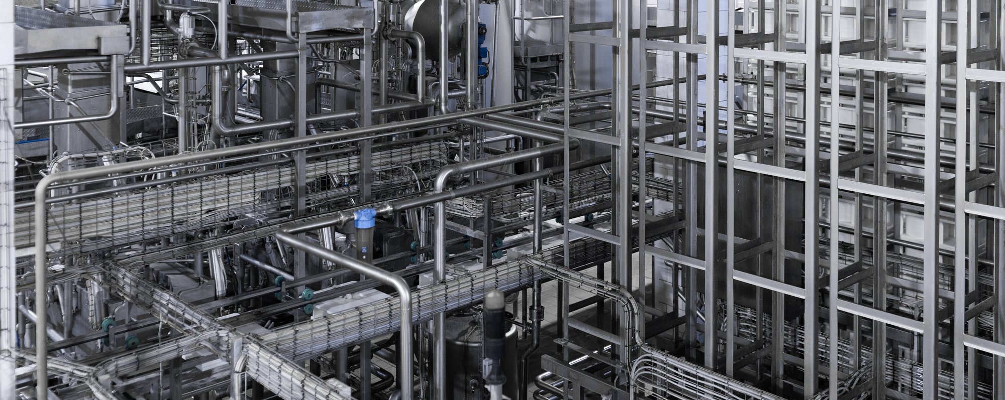 industrial-background-equipment-industrial-tools-machinery-production-factory-shops-dairy-factory-steel-water-pipeline-chrome-pipes-inside-modern-wine-factory-modern-factory-interior